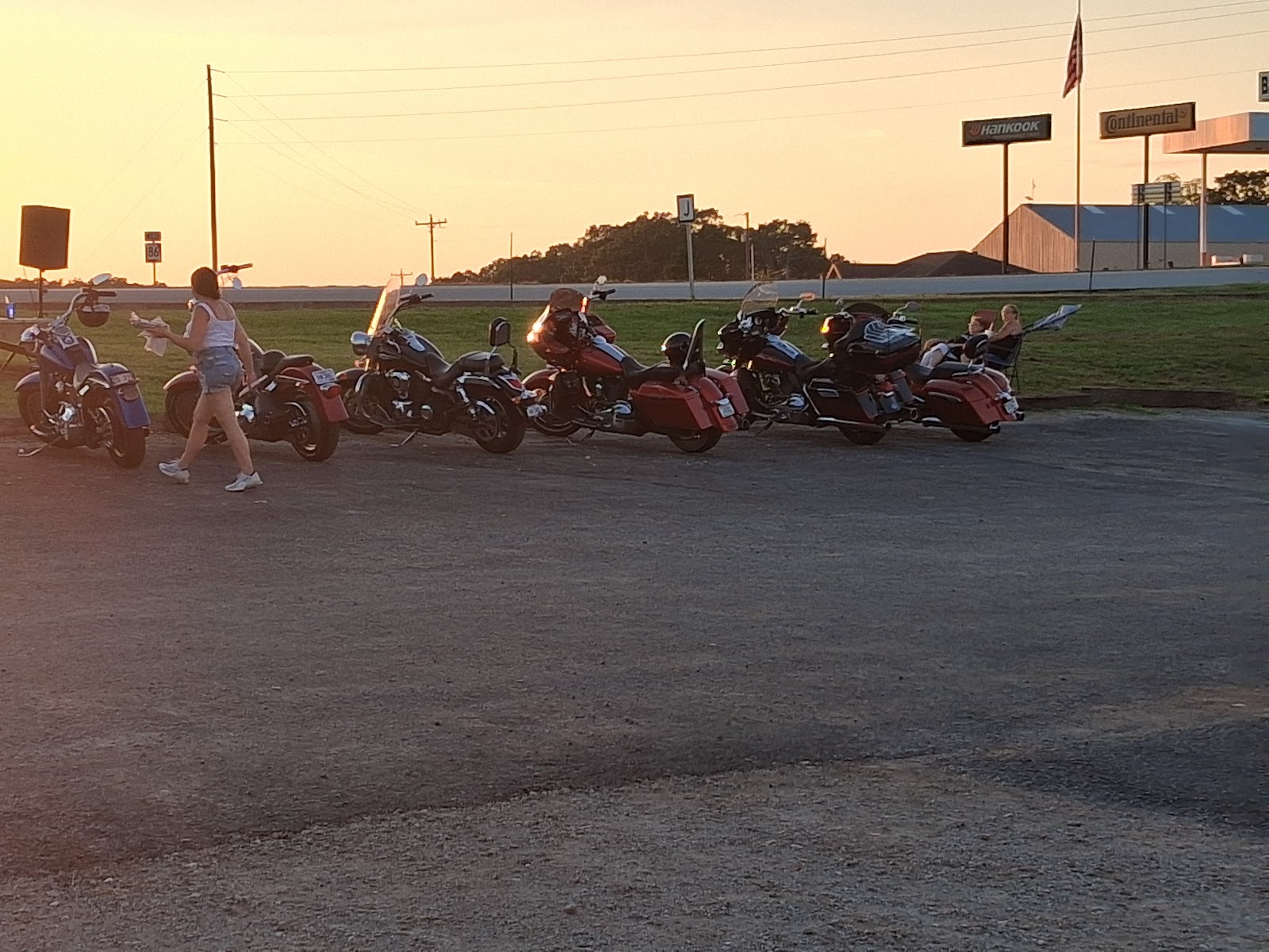 Motorcycles lined up outside on a bike night
